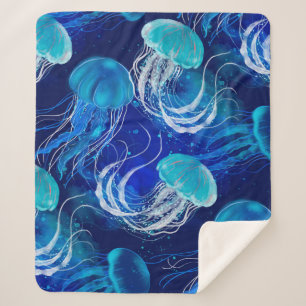 Many blue jellyfishes swimming underwater. Seamles Sherpa Blanket