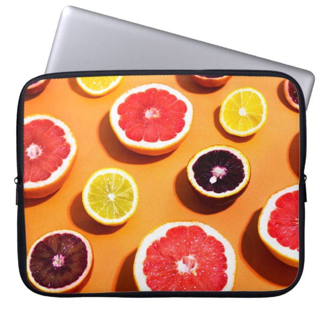 Many variety citrus fruits pattern in sunlight on  laptop sleeve (Front)