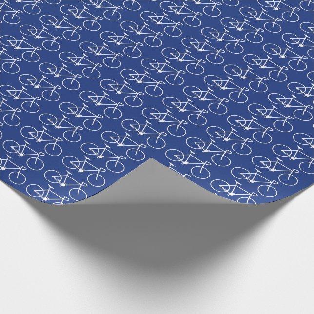 Many White Bicycle Icons on a Blue Background Wrapping Paper (Corner)