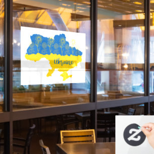 Map of Ukraine with sunflower and Ukrainian flag