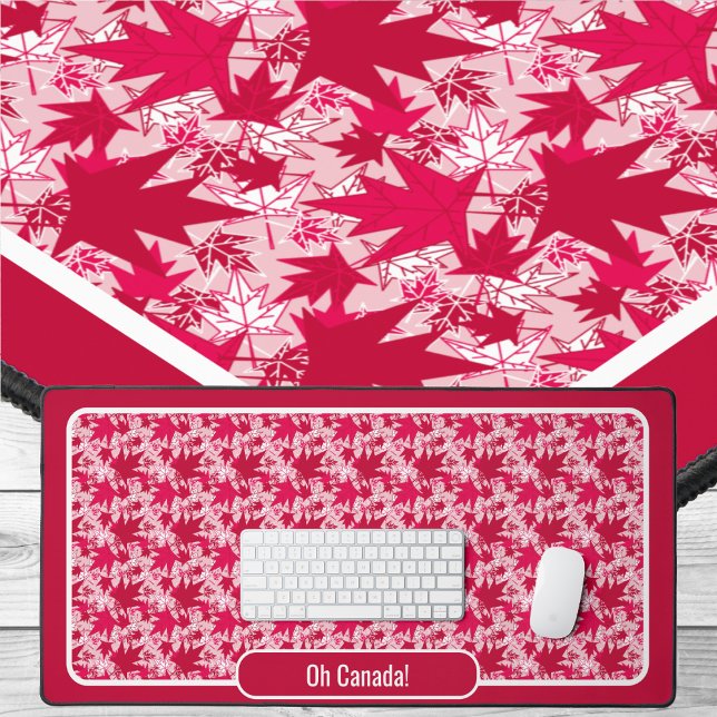 Maple Leaves on a Pink Background Desk Mat (Maple Leaves - Red and White on Pink-Desk Mat by The Canadian Outpost Shop)