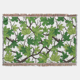 Maple leaves on white throw blanket