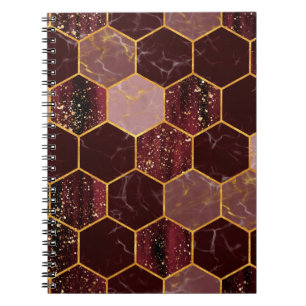 Marble hexagon seamless texture with gold notebook