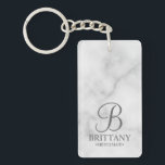 Marble Personalised Bridesmaid's Name and Monogram Key Ring<br><div class="desc">Elegant Black and White Personalised Bridesmaid Gifts featuring personalised monogram in grey elegant script font style with bridesmaid's name and title in classic serif font style on white marble background. Also perfect for groomsmen, best man, father of the bride, maid of honour, flower girl, mother of the bride and more....</div>