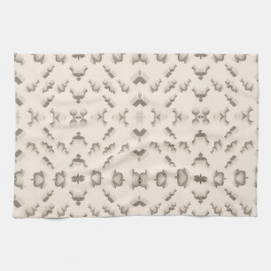 Marble textured geometric sculptures on a beige tea towel