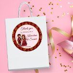 Maroon and gold cute Indian bridal couple favour Classic Round Sticker<br><div class="desc">Maroon and gold cute Indian bridal couple whimsical cartoon charicature Hindu wedding thank you favour gift sticker template,  pastel pink background maroon and gold flower border favour stickers with cute cartoon  characters</div>