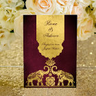 Maroon and gold elephants luxury Indian wedding 