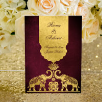 Maroon and gold elephants luxury Indian wedding 