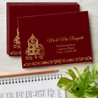 Maroon gold elephant Indian brides luxury wedding
