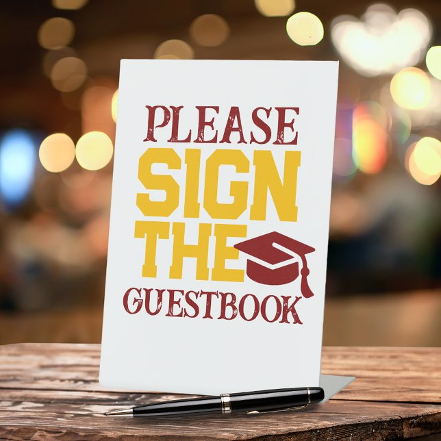 Maroon, Gold & White Guestbook Graduation Table Pedestal Sign (Maroon and Gold Graduation Cap Please Sign the Guestbook Pedestal Table Sign)