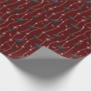 Maroon Graduation Caps and Ribbon Wrapping Paper