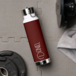 Maroon Modern Typography Personalised Water Bottle<br><div class="desc">Trendy,  vacuum insulated water bottle that features personalised name in white,  modern typography on a maroon colour background. Personalise bottle by editing name and replacing name with your own as desired. Perfect for a birthday gift,  wedding groomsman gift,  etc. Select your water bottle style. Select your water bottle style.</div>