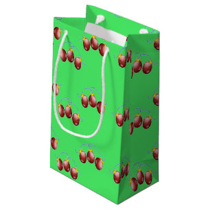 Maroon ornaments on green small gift bag