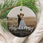 Married and Merry Newlywed Christmas Photo Ceramic Ornament<br><div class="desc">Celebrate your first holiday season as newlyweds with a married and merry Christmas ornament your friends and family. Features modern script typography.</div>