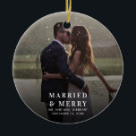 Married and Merry Wedding Photo Christmas Ceramic Ornament<br><div class="desc">Cherish the magic of your first Christmas together with our custom photo ornament, tailored just for you! Perfectly capturing your treasured memories, this elegant ornament becomes an heirloom, reminding you of that special year you began celebrating the holidays as a pair. With its timeless design and a touch of shimmering...</div>