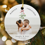 Married Christmas Cute Mistletoe Newlyweds Photo  Ceramic Ornament<br><div class="desc">Cherish your first Christmas together with our 'Married Christmas' ornament. Customised for the newlyweds' joyous memories with 2 favourite wedding photos as well as a cute watercolor mistletoe illustration,  your names and date of nuptials.🎄📸✨ #FirstChristmasJoy #PersonalizedKeepsake</div>