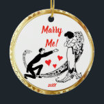 Marry Me Proposal Ceramic Ornament<br><div class="desc">Marry Me personalized Ornament features a vintage drawing in black and white line art of a man down on one knee with red hearts coming from his heart professing his love. The woman in a sweeping long gown of the glamorous 30s era looks quite taken. This beautiful ceramic ornament is...</div>