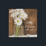 Mason Jar and White Daisies Country Barn Wedding Stone Magnet<br><div class="desc">Customise these charming Mason Jar and White Daisies Country Barn Wedding Stone Magnets with the personal names of the bride and groom and specific marriage ceremony date. These rustic chic custom ranch style wedding magnets feature a quaint floral photograph of a glass canning jar filled with a bouquet of white...</div>