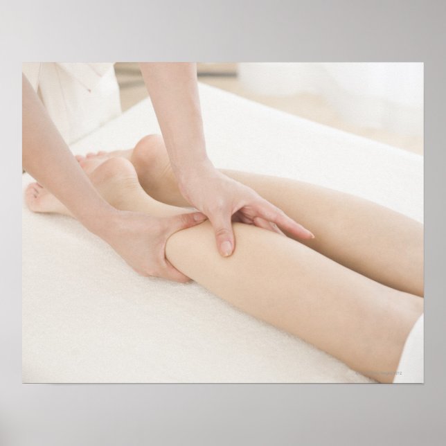 Massage therapist applying foot massage poster (Front)