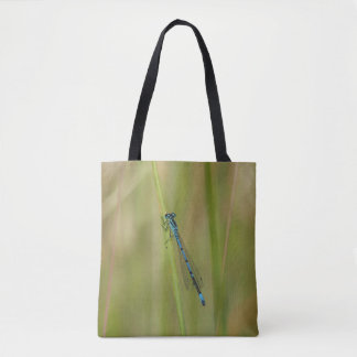 Massive bee, or maybe not, on a bag. tote bag