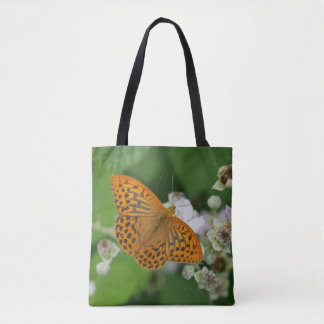 Massive bee, or maybe not, on a bag. tote bag