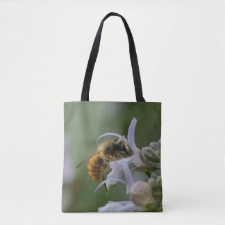 Massive bee, or maybee(!) other insect, on a bag. tote bag
