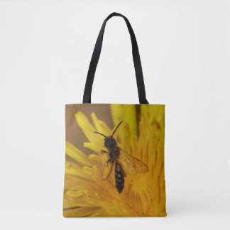 Massive bee, or maybee(!) other insect, on a bag. tote bag