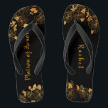 Matron of Honour Luxury Black Gold Foliage Pattern Thongs<br><div class="desc">These gorgeous black and gold foliage pattern matron of honour flip flops boasts a luxurious black and gold palette, with a stunning golden floral pattern and modern typography set against a black background, exuding elegance and sophistication. It's a beautiful gift for your bridal party. View the collection on this page...</div>