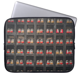 Matryoshka doll lot on shelf laptop sleeve