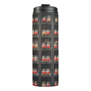 Matryoshka doll lot on shelf thermal tumbler