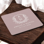 Mauve Monogram Wedding Floral Crest Elegant Square Paper Coaster<br><div class="desc">Add a refined touch to your wedding tablescape with our Mauve Monogram Wedding Floral Crest Elegant Square Paper Coaster. Featuring a delicate floral crest surrounding your custom monogram, this design combines soft mauve tones with timeless elegance. Perfect for receptions, bridal showers, or engagement parties, these coasters protect surfaces while enhancing...</div>