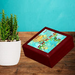 Mayan Turquoise & Golden Misty Caribbean Gift Box<br><div class="desc">This airy and luminous design celebrates the Yucatan Peninsula Mayan culture. It shows a Mayan warrior sculpture, looking at the horizon. Its exquisite turquoise and golden baseboard evokes the indigenous Mexican Caribbean. Ethnic Mexican art at its finest. The entire design is covered by a sheer veil, with delicate golden and...</div>