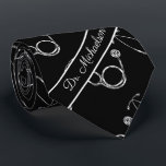Medical Doctor Stethoscope Pattern Physician Name Tie<br><div class="desc">This design is great for doctors,  nurses,  physicians,  and any many other medical practitioners. The stethoscope patterns sits on top of a black background,  and at the bottom of the tie is a space to add the name of the person wearing the tie.</div>