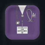 Medical School Graduation Party Paper Plate<br><div class="desc">Doctor graduation party plates design featuring purple hospital scrubs and a Swiss Army knife in the pocket. Edit text to personalise for your favourite medical school graduate.</div>