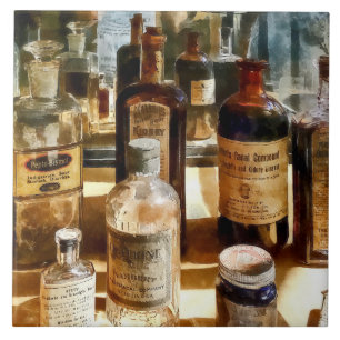 Medicine Bottles in Glass Case Ceramic Tile