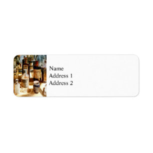 Medicine Bottles in Glass Case Return Address Label
