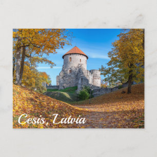 Medieval castle surrounded by forest postcard