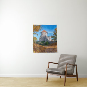 Medieval castle surrounded by forest tapestry