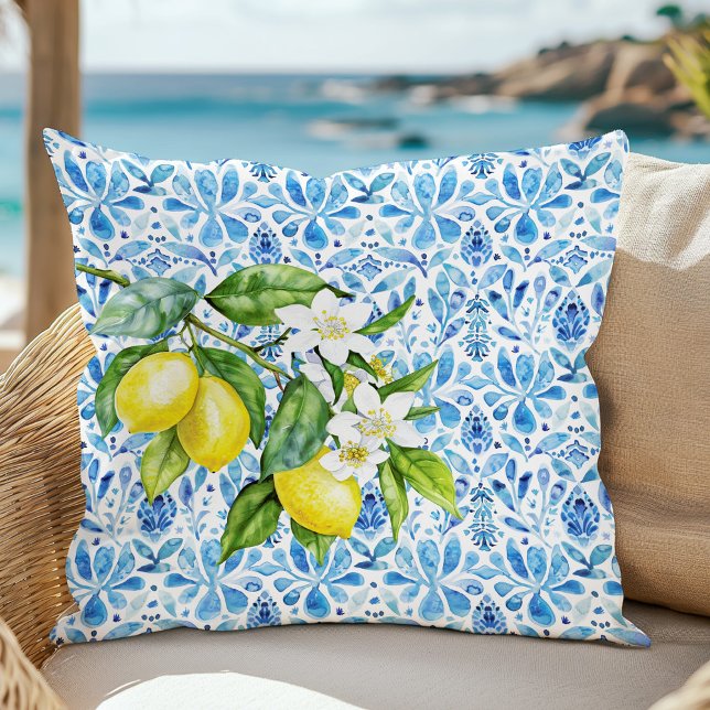 Mediterranean Citrus and Blue Tiles Cushion (Mediterranean Citrus and Blue Tiles Throw Pillow in a sofa at a sunny beach.)