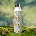 Mediterranean Lemon Tile Italian Coastal Design Water Bottle<br><div class="desc">Bring the warmth of the Mediterranean into your space with this charming Italian ceramic tile inspired pattern featuring bright lemons,  olives,  floral motifs,  and a radiant sun face. The design is inspired by traditional Mediterranean and Italy Coast ceramics,  blending classic blue ornamental details with sunny yellow citrus elements.</div>