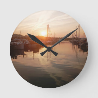 Mediterranean Sunrise over a Marina Wall Clock