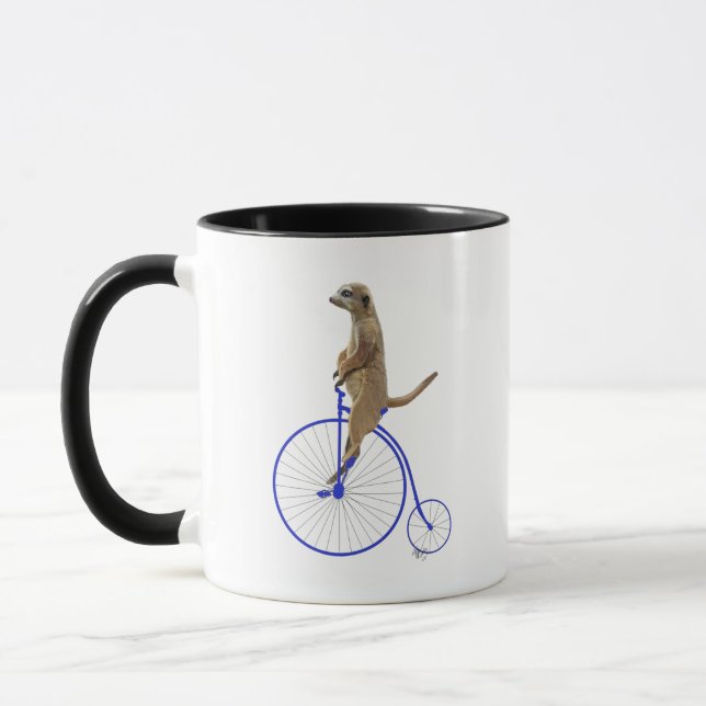 Meerkat On Blue Penny Farthing Mug (Left)