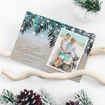 Mele Kalikimaka Beach Photo Holiday Card<br><div class="desc">Elegant hawaiian christmas card featuring a tropical ocean shoreline,  palm leaves,  string twinkle lights,  a family portrait picture,  the saying 'mele kalikimaka' drawn into the sand,  a personalised message,  and your name.</div>