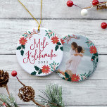 Mele Kalikimaka | Hawaiian Christmas Photo Ceramic Tree Decoration<br><div class="desc">Festive holiday ornament features the Hawaiian Christmas greeting "Mele Kalikimaka" in red hand lettered typography,  surrounded by red poinsettias,  holly leaves and Christmas greenery. Customise with the year,  and add a favourite photo or vacation snapshot to the reverse side,  adorned with matching holiday florals.</div>