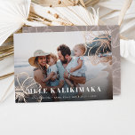 Mele Kalikimaka | Hawaiian Floral Photo Foil Holiday Card<br><div class="desc">Chic holiday photo card features "Mele Kalikimaka, " the Hawaiian Christmas greeting,  in white lettering as an overlay on your favourite beach or vacation photo,  with rose gold foil tropical hibiscus flowers peeking out at the corners.</div>