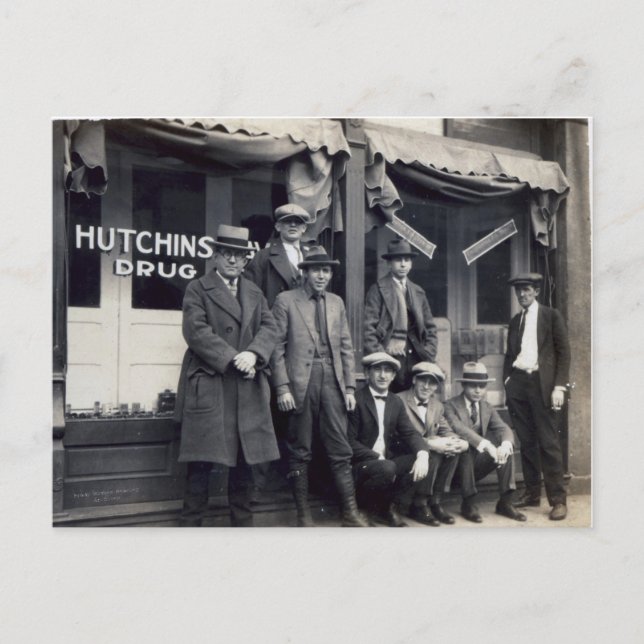 Men In Front of  Hutchings-Davis Drug Store Postcard (Front)