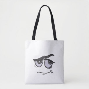 menacing eyes with large black eyebrows and a smil tote bag
