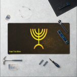 Menorah Flame Desk Mat<br><div class="desc">A brown and gold digital rendering of the Jewish seven-branched menorah (Hebrew: מְנוֹרָה). Customise by adding your own text. The seven-branched menorah, used in the portable sanctuary set up by Moses in the wilderness and later in the Temple in Jerusalem, has been a symbol of Judaism since ancient times and...</div>