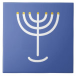 Menorah White Gold Blue Ceramic Tile<br><div class="desc">Menorah white gold blue tile. Personalise by adding your own name. To make this your own design 'Click to Customise Further" … or 'Transfer this design' to print the same design onto a different product. Where does the Menorah come from? It comes from the Bible, in the book of Exodus,...</div>