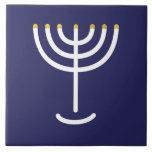 Menorah White Gold Navy Ceramic Tile<br><div class="desc">Menorah white gold blue tile. Personalise by adding your own name. To make this your own design 'Click to Customise Further" … or 'Transfer this design' to print the same design onto a different product. Where does the Menorah come from? It comes from the Bible, in the book of Exodus,...</div>